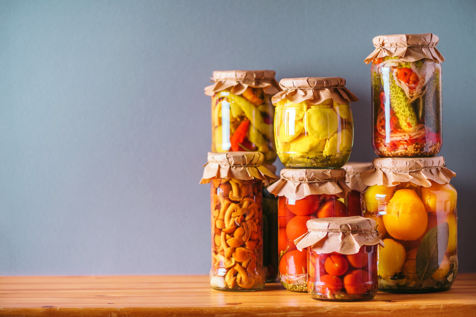 Preserved and fermented food in glass jars. Fermented food. Autumn canning. ?ucumber, squash and